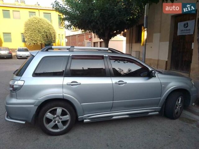 Сірий Міцубісі Аутлендер, об'ємом двигуна 2 л та пробігом 420 тис. км за 6140 $, фото 2 на Automoto.ua