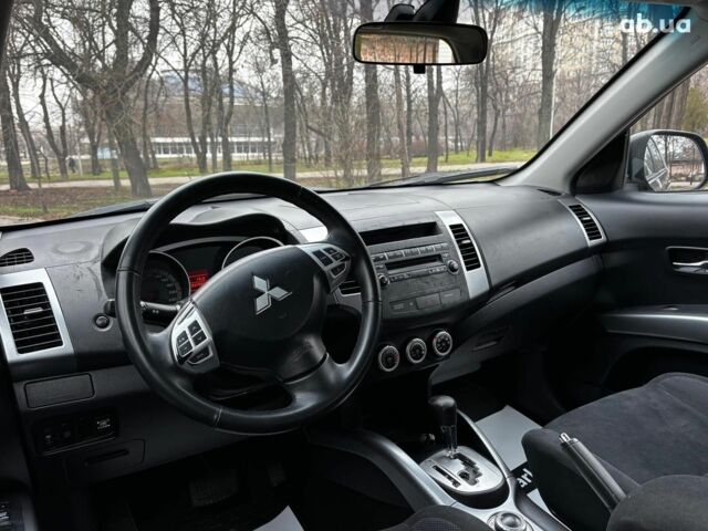 Серый Мицубиси Аутлендер, объемом двигателя 2.4 л и пробегом 237 тыс. км за 8490 $, фото 15 на Automoto.ua