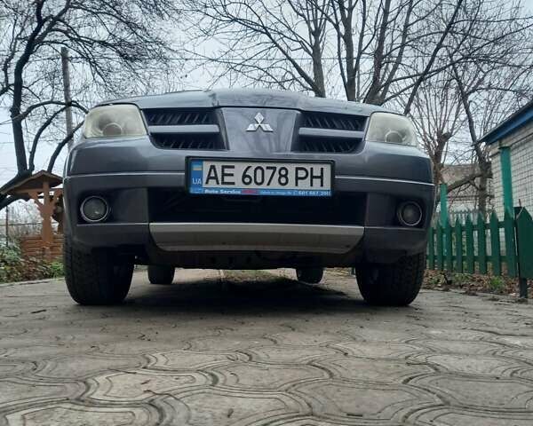 Серый Мицубиси Аутлендер, объемом двигателя 2.38 л и пробегом 143 тыс. км за 7300 $, фото 23 на Automoto.ua