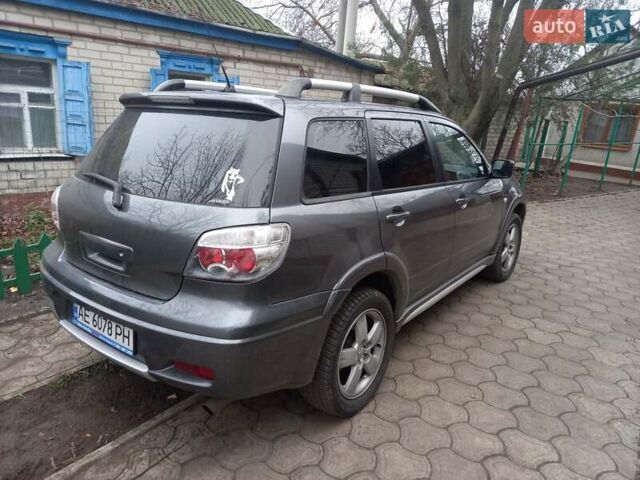 Серый Мицубиси Аутлендер, объемом двигателя 2.38 л и пробегом 143 тыс. км за 7300 $, фото 8 на Automoto.ua