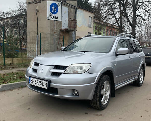 Серый Мицубиси Аутлендер, объемом двигателя 2 л и пробегом 247 тыс. км за 5999 $, фото 9 на Automoto.ua