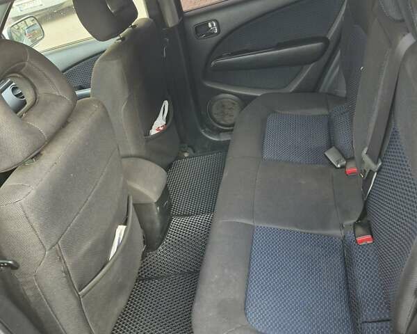 Сірий Міцубісі Аутлендер, об'ємом двигуна 2 л та пробігом 247 тис. км за 5600 $, фото 9 на Automoto.ua