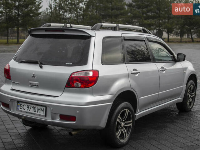 Сірий Міцубісі Аутлендер, об'ємом двигуна 2 л та пробігом 258 тис. км за 5650 $, фото 12 на Automoto.ua