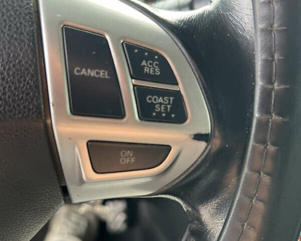 Серый Мицубиси Аутлендер, объемом двигателя 2.38 л и пробегом 197 тыс. км за 7699 $, фото 12 на Automoto.ua