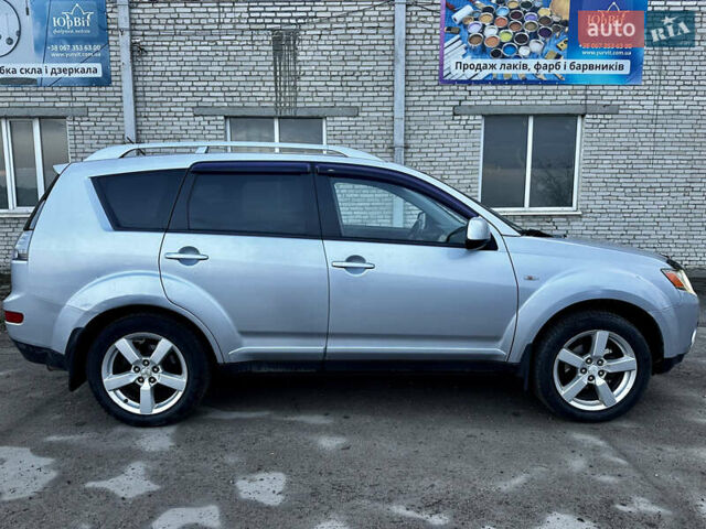 Сірий Міцубісі Аутлендер, об'ємом двигуна 2.4 л та пробігом 273 тис. км за 8400 $, фото 13 на Automoto.ua