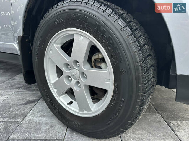 Серый Мицубиси Аутлендер, объемом двигателя 2.4 л и пробегом 61 тыс. км за 11300 $, фото 67 на Automoto.ua