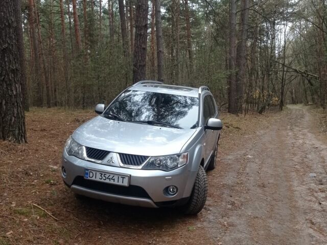 Сірий Міцубісі Аутлендер, об'ємом двигуна 2.4 л та пробігом 190 тис. км за 9200 $, фото 1 на Automoto.ua