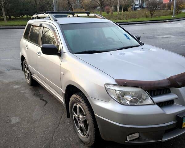 Сірий Міцубісі Аутлендер, об'ємом двигуна 2 л та пробігом 161 тис. км за 7500 $, фото 9 на Automoto.ua