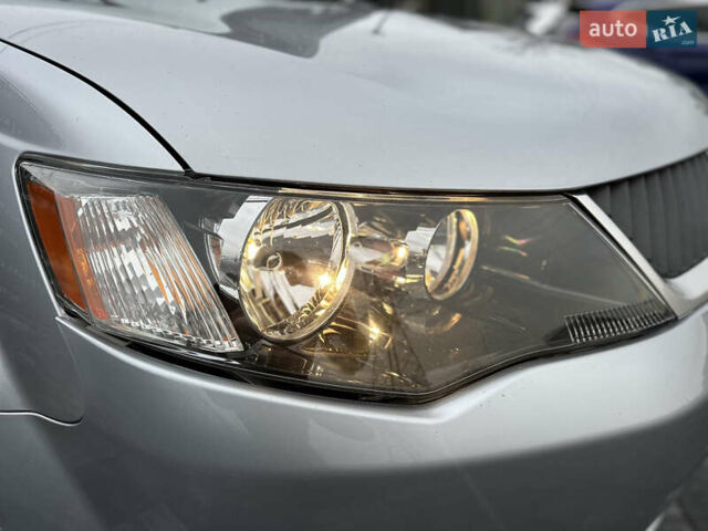 Серый Мицубиси Аутлендер, объемом двигателя 2.4 л и пробегом 61 тыс. км за 11300 $, фото 14 на Automoto.ua