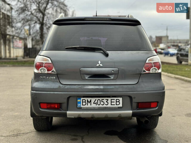 Серый Мицубиси Аутлендер, объемом двигателя 2.38 л и пробегом 254 тыс. км за 7300 $, фото 12 на Automoto.ua