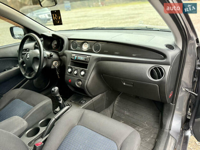 Серый Мицубиси Аутлендер, объемом двигателя 2 л и пробегом 199 тыс. км за 5999 $, фото 16 на Automoto.ua