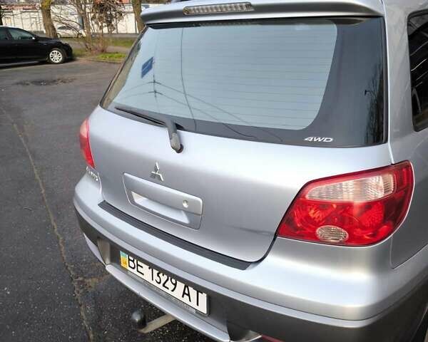 Сірий Міцубісі Аутлендер, об'ємом двигуна 2 л та пробігом 161 тис. км за 7500 $, фото 12 на Automoto.ua
