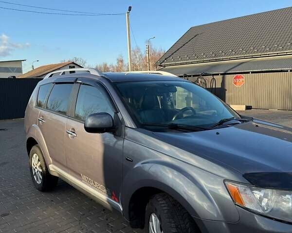 Серый Мицубиси Аутлендер, объемом двигателя 2.18 л и пробегом 287 тыс. км за 10200 $, фото 3 на Automoto.ua
