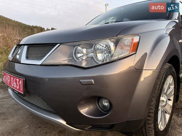 Сірий Міцубісі Аутлендер, об'ємом двигуна 2 л та пробігом 235 тис. км за 8950 $, фото 67 на Automoto.ua