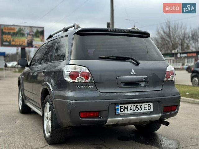 Серый Мицубиси Аутлендер, объемом двигателя 2.38 л и пробегом 254 тыс. км за 7300 $, фото 11 на Automoto.ua