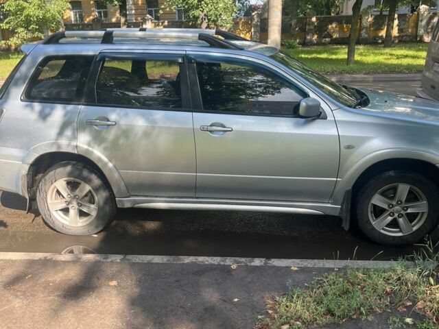 Серый Мицубиси Аутлендер, объемом двигателя 2.4 л и пробегом 225 тыс. км за 6500 $, фото 6 на Automoto.ua