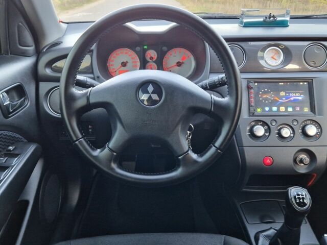 Міцубісі Аутлендер 2008 у Кременчуге на Automoto.ua Сірий Міцубісі Аутлендер, об'ємом двигуна 2 л та пробігом 157 тис. км за 8300 $, фото 14 на Automoto.ua