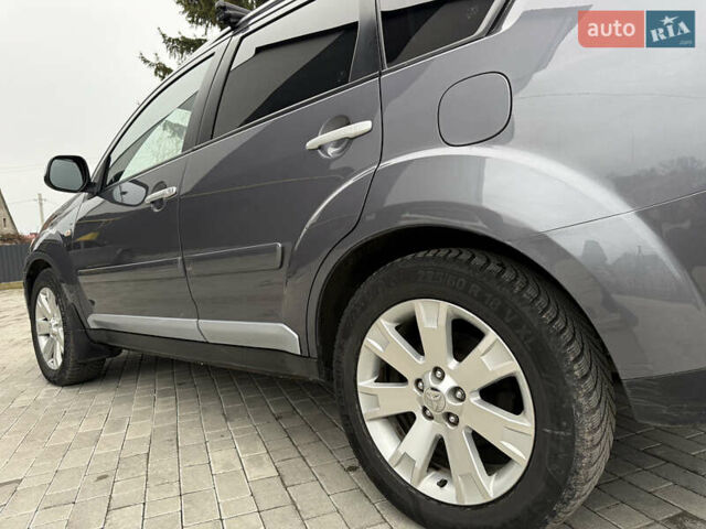 Сірий Міцубісі Аутлендер, об'ємом двигуна 2 л та пробігом 237 тис. км за 8999 $, фото 26 на Automoto.ua