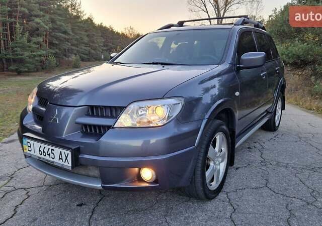 Серый Мицубиси Аутлендер, объемом двигателя 2 л и пробегом 157 тыс. км за 8300 $, фото 9 на Automoto.ua