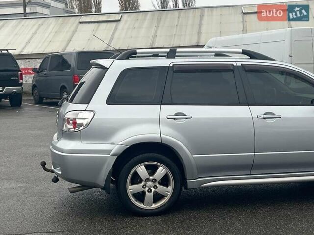 Серый Мицубиси Аутлендер, объемом двигателя 2.4 л и пробегом 324 тыс. км за 6890 $, фото 12 на Automoto.ua
