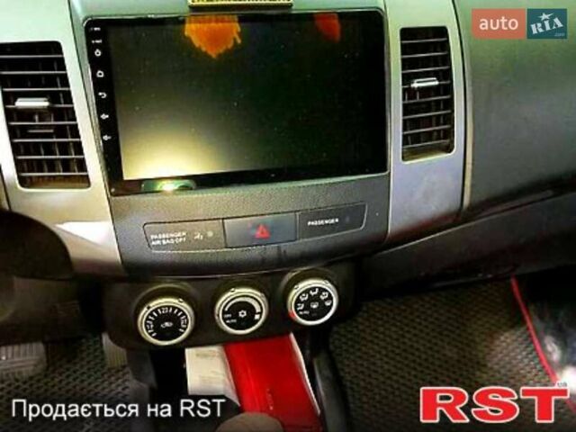 Серый Мицубиси Аутлендер, объемом двигателя 2.4 л и пробегом 223 тыс. км за 8800 $, фото 3 на Automoto.ua