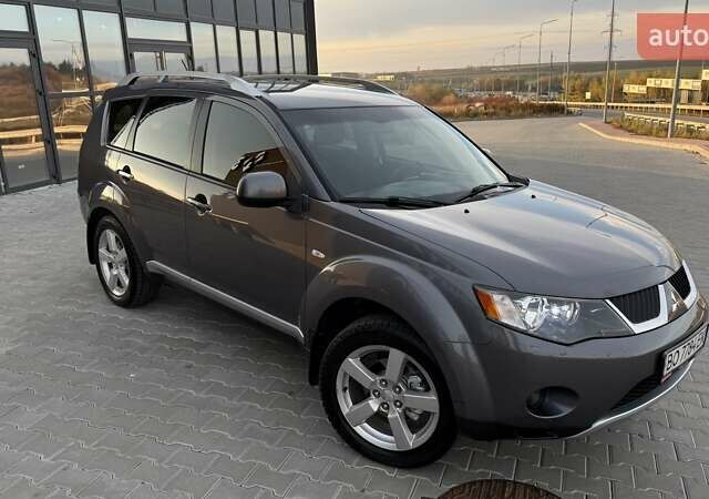 Серый Мицубиси Аутлендер, объемом двигателя 2.4 л и пробегом 174 тыс. км за 9599 $, фото 9 на Automoto.ua