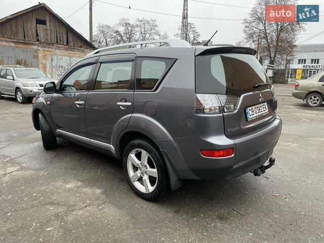 Серый Мицубиси Аутлендер, объемом двигателя 3 л и пробегом 294 тыс. км за 8200 $, фото 6 на Automoto.ua