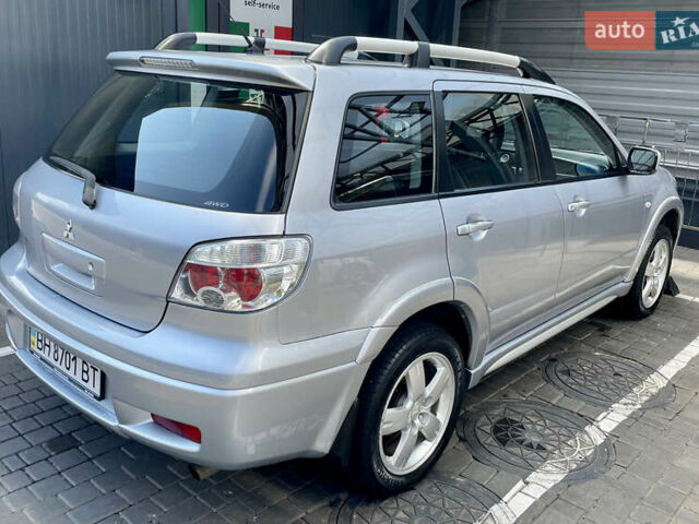 Сірий Міцубісі Аутлендер, об'ємом двигуна 2 л та пробігом 130 тис. км за 8500 $, фото 3 на Automoto.ua