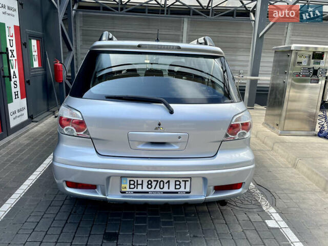 Сірий Міцубісі Аутлендер, об'ємом двигуна 2 л та пробігом 130 тис. км за 8500 $, фото 2 на Automoto.ua