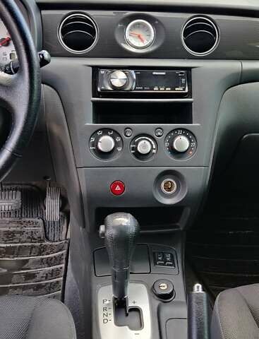 Серый Мицубиси Аутлендер, объемом двигателя 2.38 л и пробегом 323 тыс. км за 6800 $, фото 8 на Automoto.ua