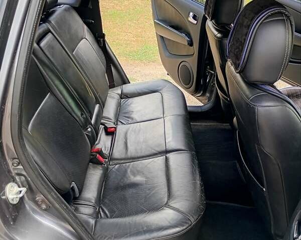 Серый Мицубиси Аутлендер, объемом двигателя 2.35 л и пробегом 342 тыс. км за 6900 $, фото 6 на Automoto.ua