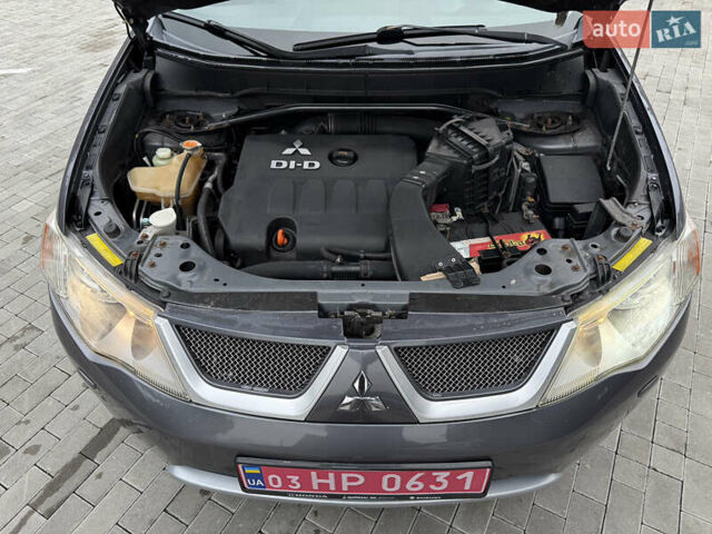 Сірий Міцубісі Аутлендер, об'ємом двигуна 2 л та пробігом 237 тис. км за 8999 $, фото 55 на Automoto.ua