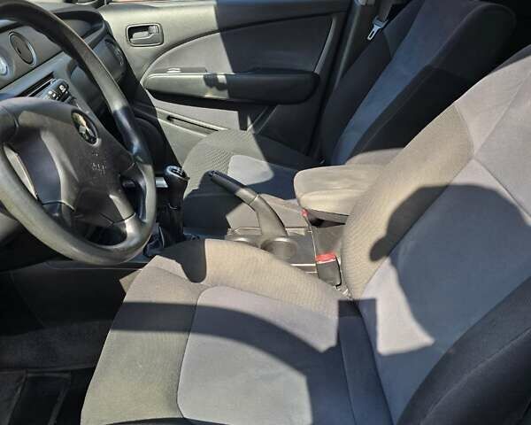 Серый Мицубиси Аутлендер, объемом двигателя 2 л и пробегом 151 тыс. км за 7500 $, фото 4 на Automoto.ua