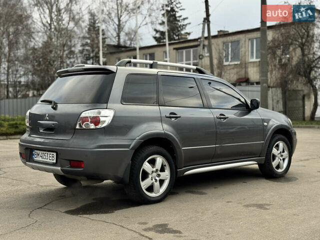 Серый Мицубиси Аутлендер, объемом двигателя 2.38 л и пробегом 254 тыс. км за 7300 $, фото 15 на Automoto.ua