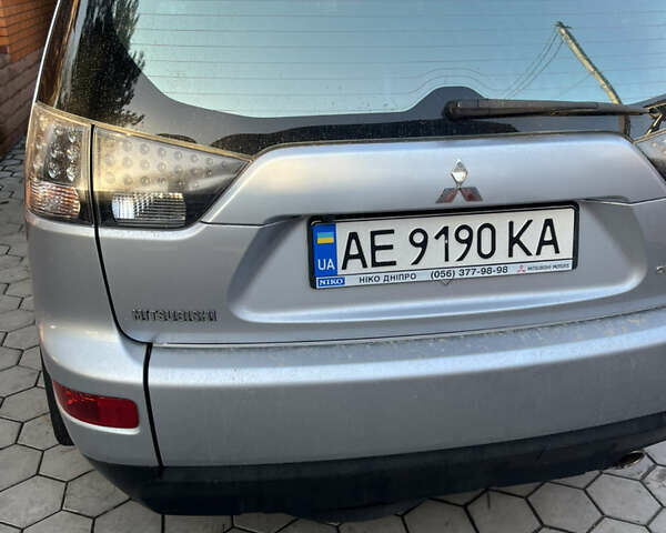 Сірий Міцубісі Аутлендер, об'ємом двигуна 2.36 л та пробігом 195 тис. км за 9500 $, фото 11 на Automoto.ua