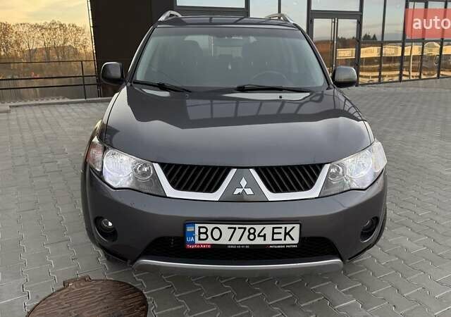 Серый Мицубиси Аутлендер, объемом двигателя 2.4 л и пробегом 174 тыс. км за 9599 $, фото 11 на Automoto.ua