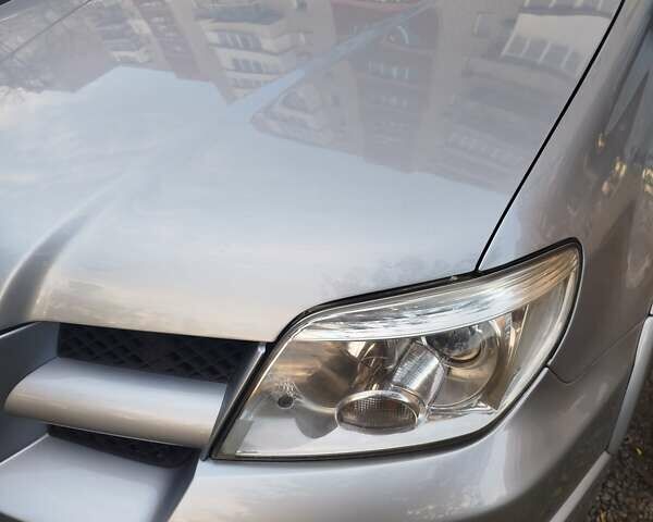 Сірий Міцубісі Аутлендер, об'ємом двигуна 2.38 л та пробігом 209 тис. км за 7460 $, фото 8 на Automoto.ua