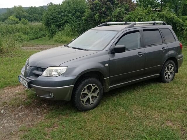 Сірий Міцубісі Аутлендер, об'ємом двигуна 2 л та пробігом 208 тис. км за 6000 $, фото 1 на Automoto.ua