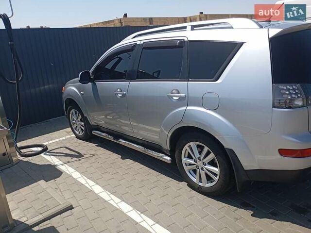 Сірий Міцубісі Аутлендер, об'ємом двигуна 2.4 л та пробігом 220 тис. км за 10200 $, фото 3 на Automoto.ua