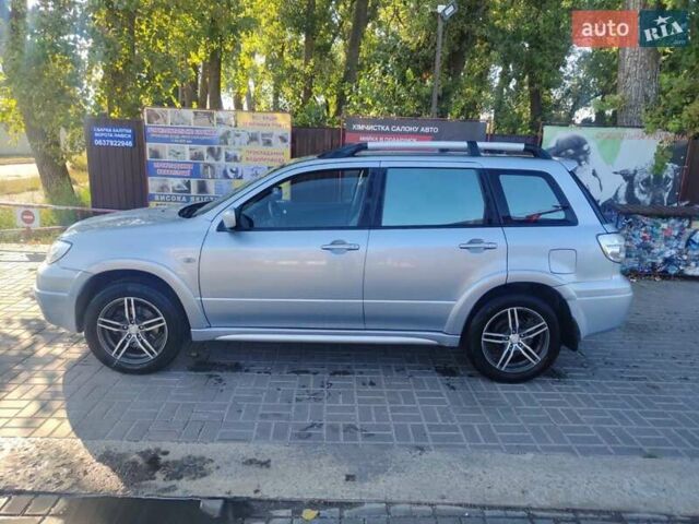 Сірий Міцубісі Аутлендер, об'ємом двигуна 2.38 л та пробігом 180 тис. км за 5700 $, фото 9 на Automoto.ua