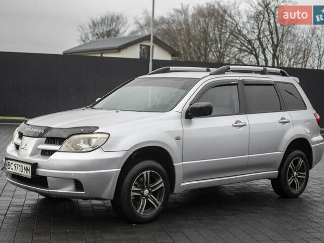 Сірий Міцубісі Аутлендер, об'ємом двигуна 2 л та пробігом 258 тис. км за 5650 $, фото 4 на Automoto.ua