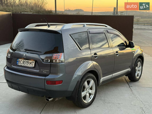 Серый Мицубиси Аутлендер, объемом двигателя 2.4 л и пробегом 210 тыс. км за 8300 $, фото 12 на Automoto.ua