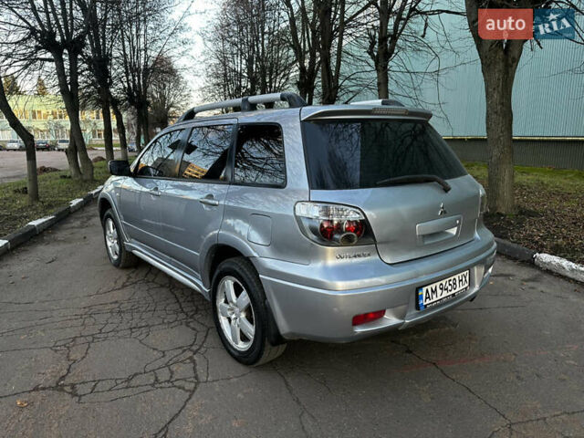 Серый Мицубиси Аутлендер, объемом двигателя 2.4 л и пробегом 320 тыс. км за 6000 $, фото 9 на Automoto.ua