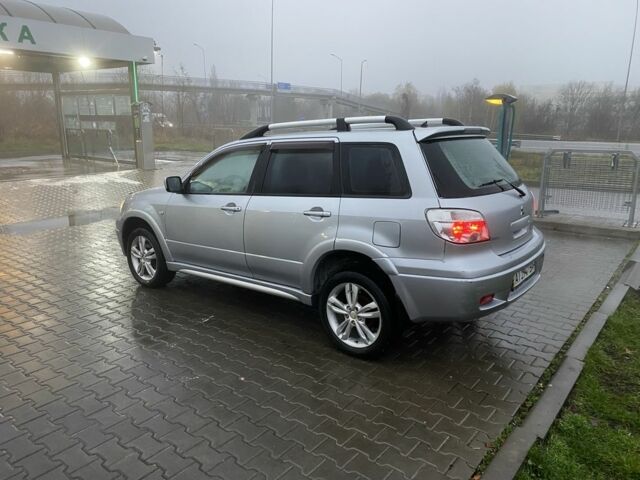 Сірий Міцубісі Аутлендер, об'ємом двигуна 2.4 л та пробігом 299 тис. км за 6300 $, фото 3 на Automoto.ua