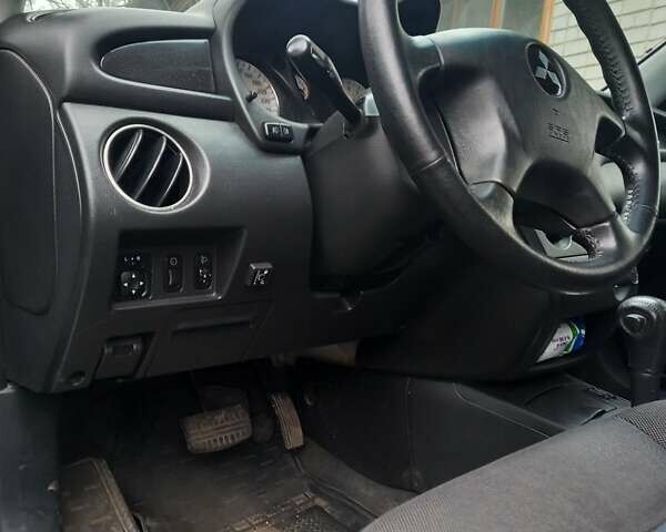 Серый Мицубиси Аутлендер, объемом двигателя 2.38 л и пробегом 143 тыс. км за 7300 $, фото 13 на Automoto.ua