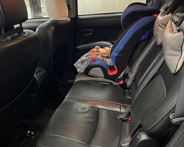 Сірий Міцубісі Аутлендер, об'ємом двигуна 3 л та пробігом 209 тис. км за 9800 $, фото 37 на Automoto.ua