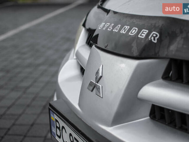 Сірий Міцубісі Аутлендер, об'ємом двигуна 2 л та пробігом 258 тис. км за 5650 $, фото 17 на Automoto.ua