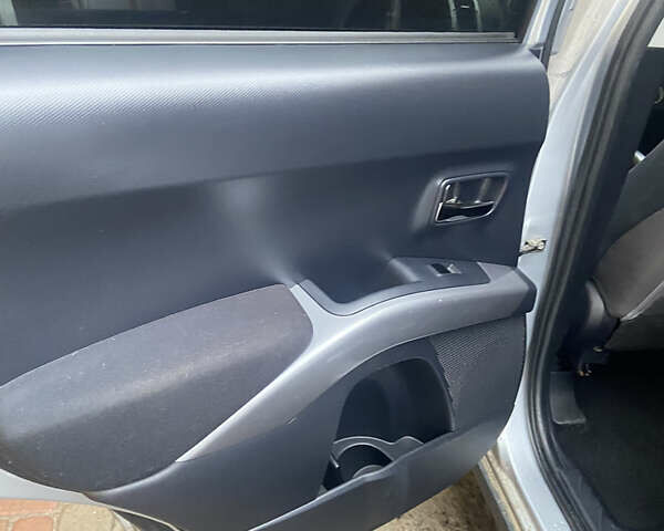 Серый Мицубиси Аутлендер, объемом двигателя 1.97 л и пробегом 229 тыс. км за 8500 $, фото 19 на Automoto.ua