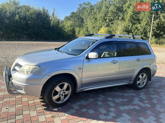 Сірий Міцубісі Аутлендер, об'ємом двигуна 2 л та пробігом 340 тис. км за 6800 $, фото 9 на Automoto.ua