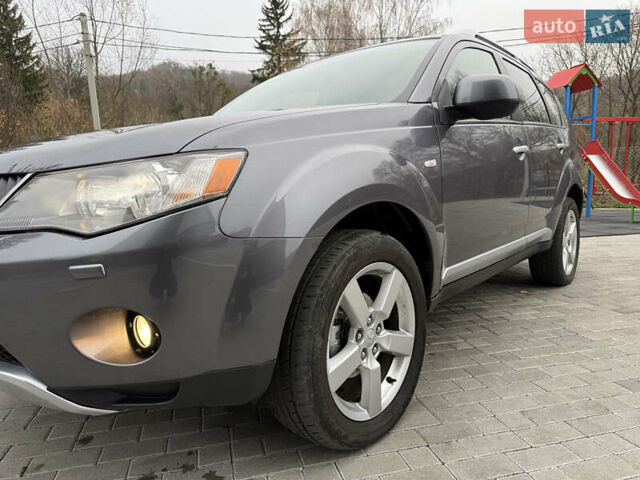 Серый Мицубиси Аутлендер, объемом двигателя 2.2 л и пробегом 162 тыс. км за 10000 $, фото 13 на Automoto.ua